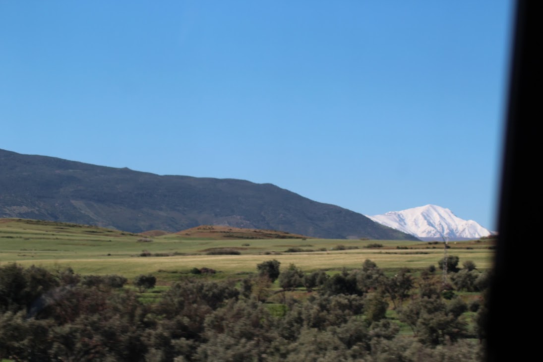 A glimpse of snowy mountains heading out of Marrakesh